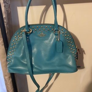 Blue and gold coach bag